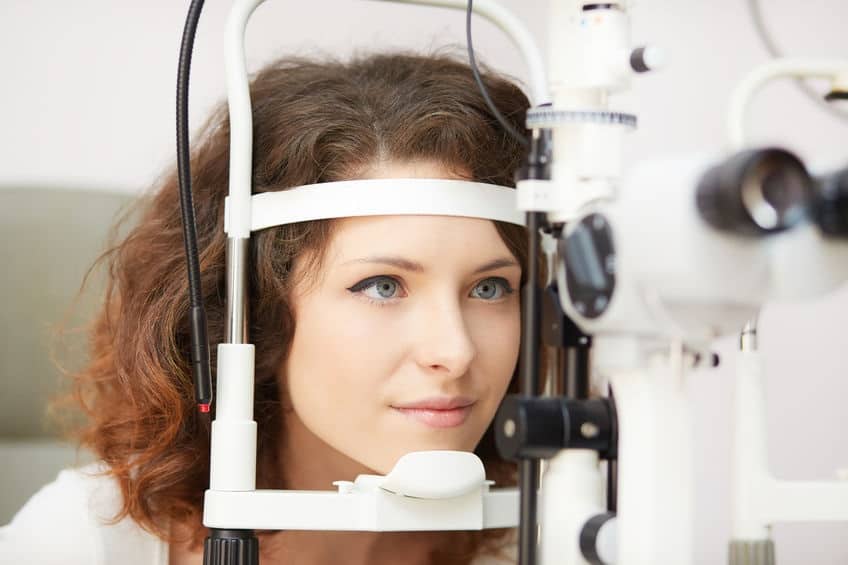 young woman taking eye care